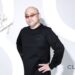 A picture of Hideki Kamiya, Clovers Studio Headm with the Clovers logo and his signature